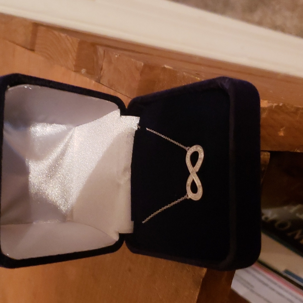 Beautiful Infinity Knot, silver necklace with whisper chain